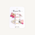Butterfly hair clips for girls with floral fabric covered snap clips and pink butterfly details