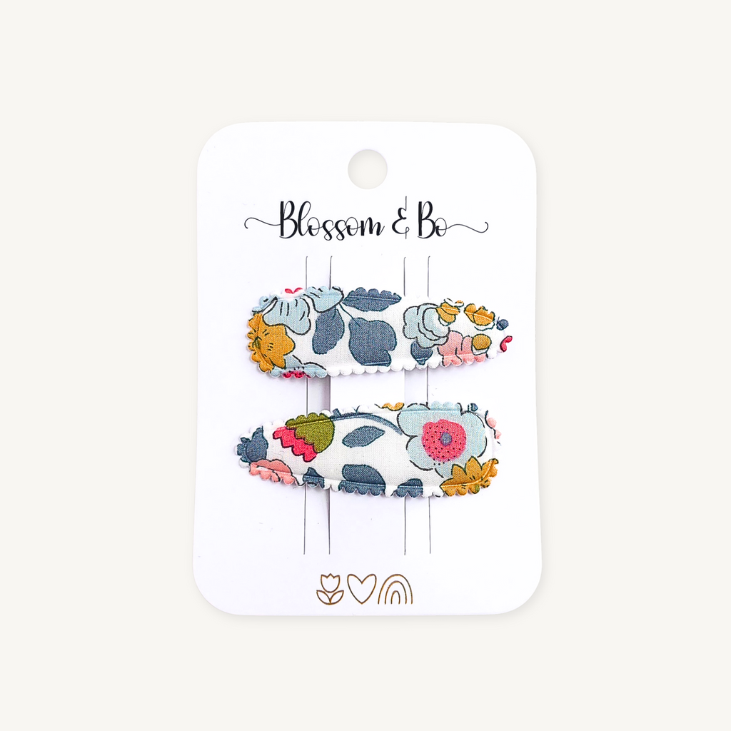 Grey Liberty floral snap clips on Blossom & Bo display card