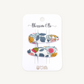 Grey Liberty floral snap clips on Blossom & Bo display card