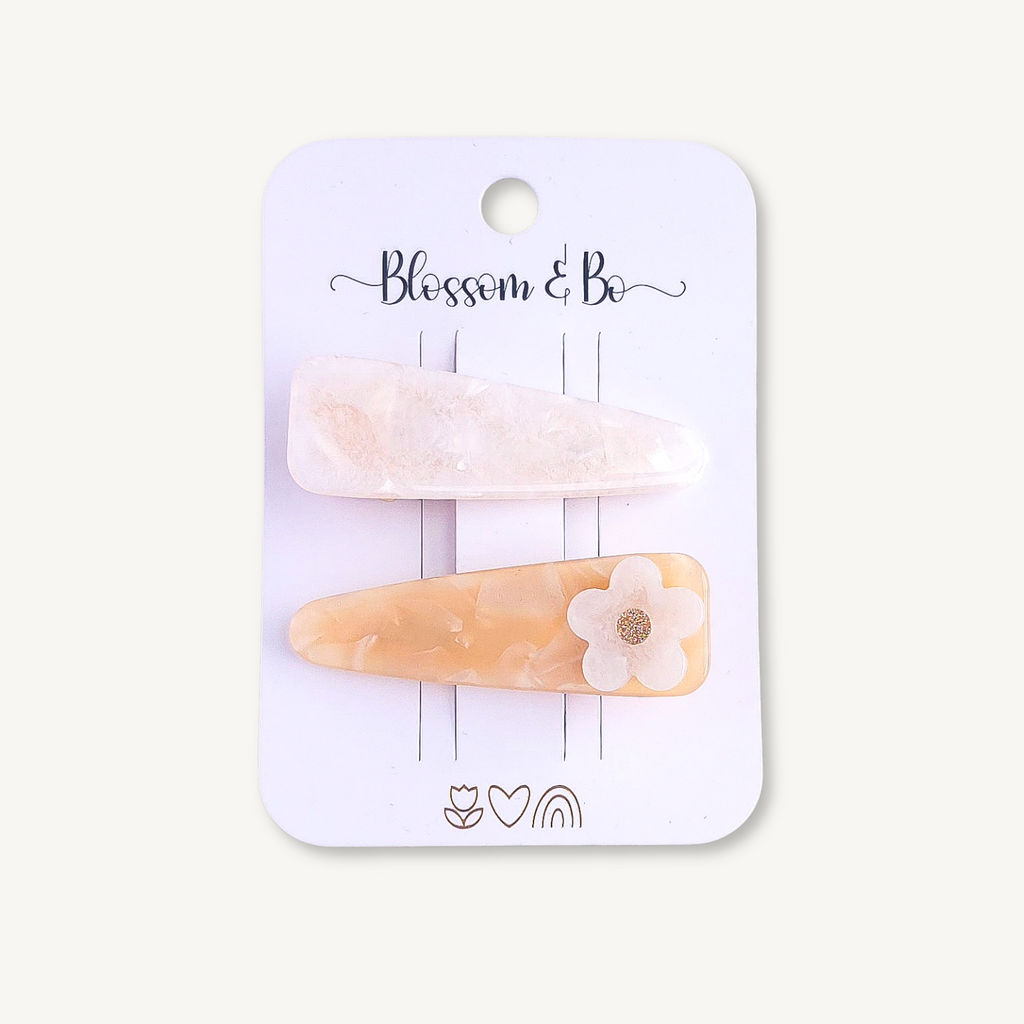 Daisy acrylic hair clips for girls with pearlescent and buttery marbled finishes