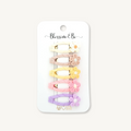 Pastel flower hair clips in a set of 5 with cream, tan, yellow, pink and lilac flowers