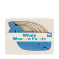 Whale wooden puzzle with 'Rex London' branding on a white background