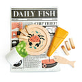 Tender Leaf wooden fish and chips play set on a newspaper.