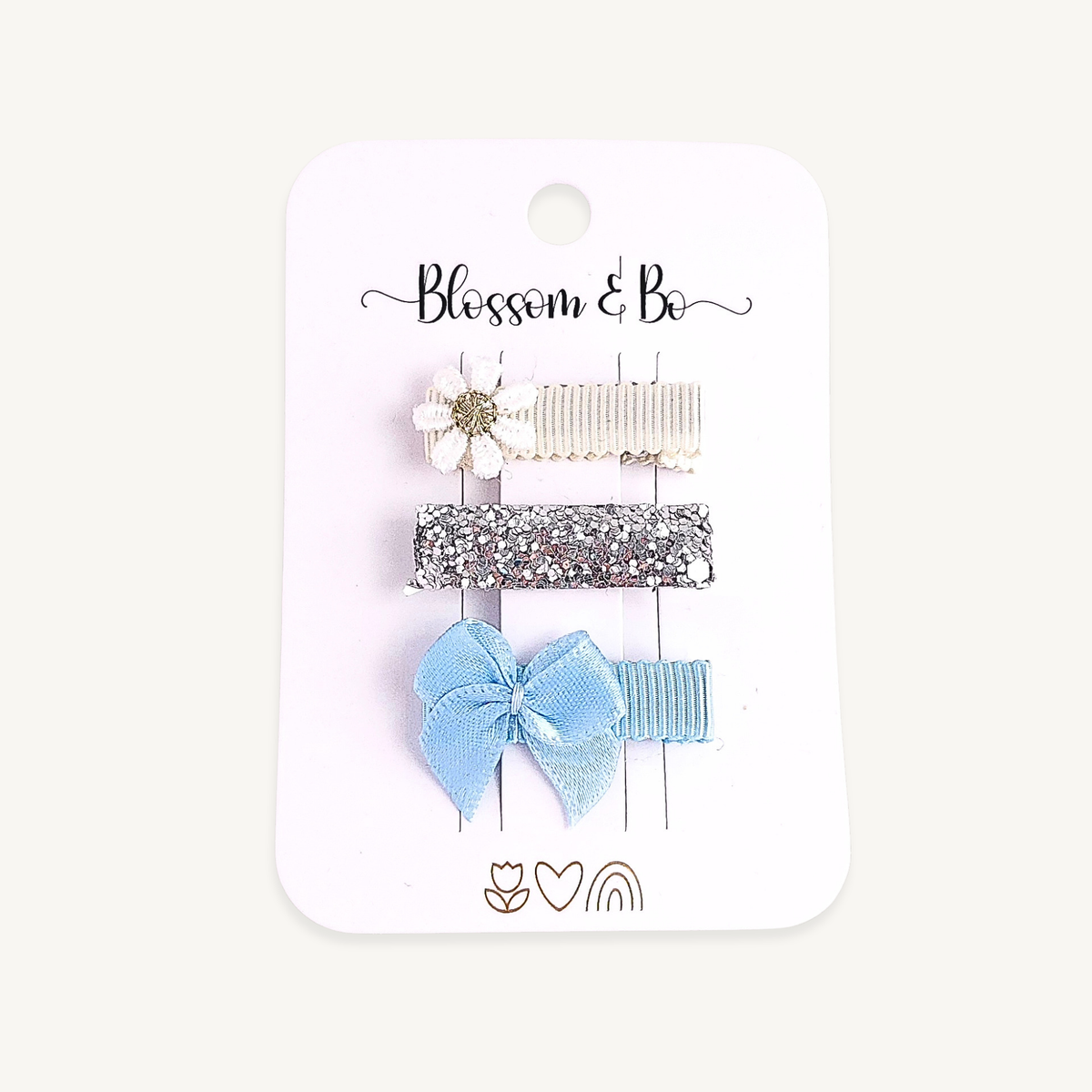 Baby and toddler hair clips with white daisy, silver glitter and blue satin bow