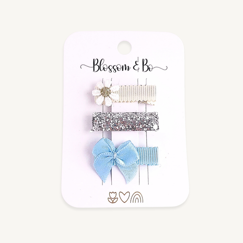 Baby and toddler hair clips with white daisy, silver glitter and blue satin bow