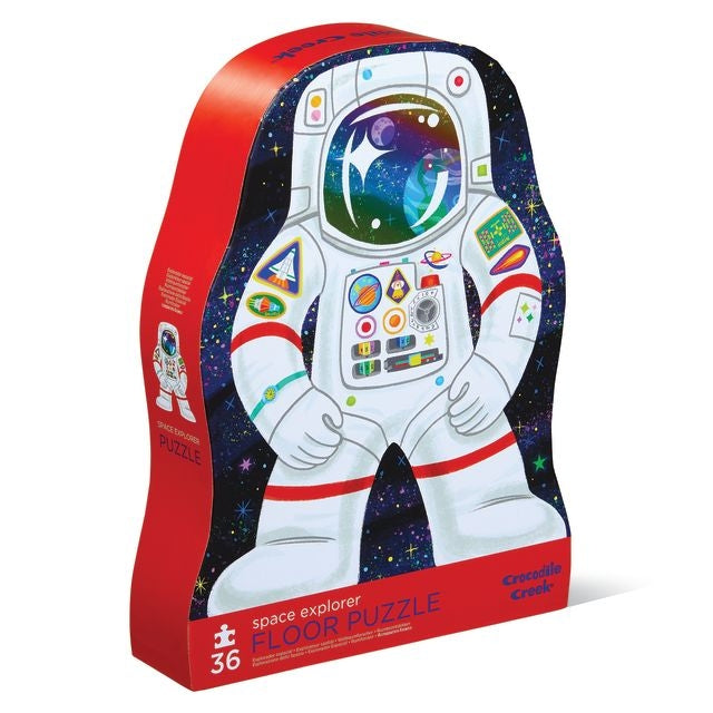 Astronaut-themed floor puzzle packaging with a colorful design on a white background
