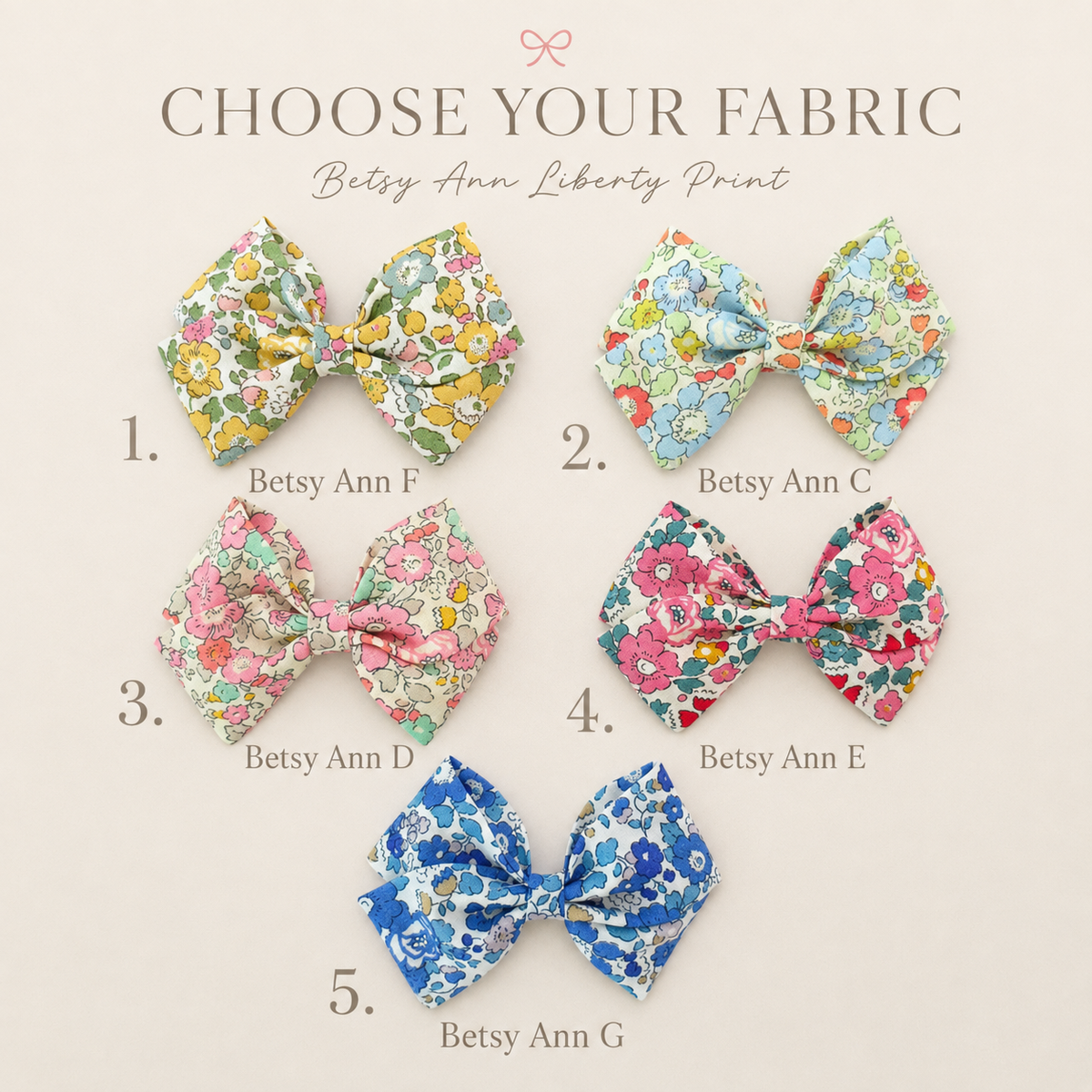 A fabric selection chart showing six bow-shaped hair clips in different Liberty print patterns, labeled 1 through 5 with names Betsy Ann F through Betsy Ann G, under the heading 'CHOOSE YOUR FABRIC' and 'Betsy Ann Liberty Print' on a light beige background.