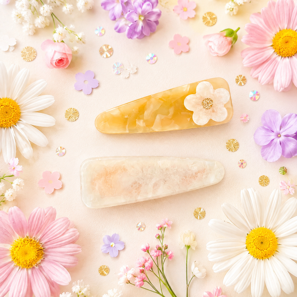 Daisy acrylic hair clip with peach marbled finish and cream flower detail