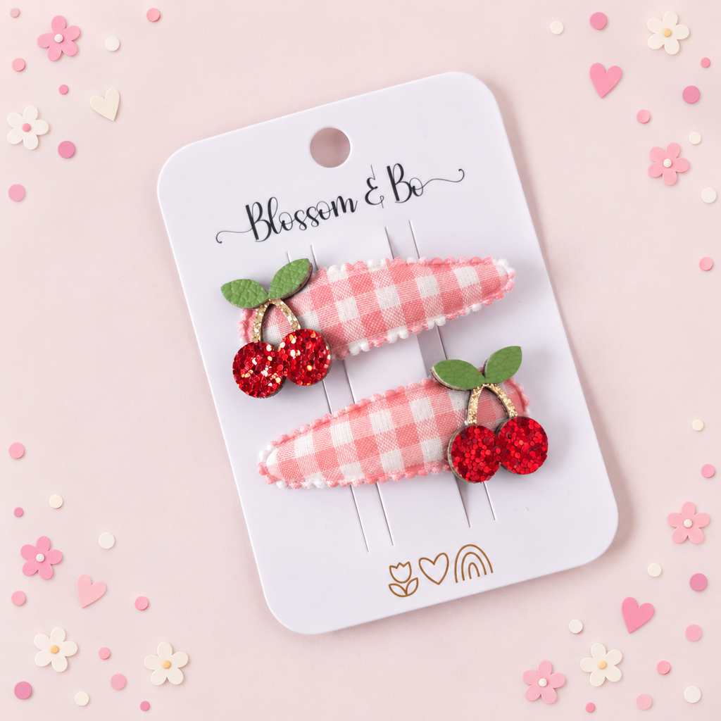 Cherry hair clips for girls with glitter cherry embellishments and pink gingham ribbon