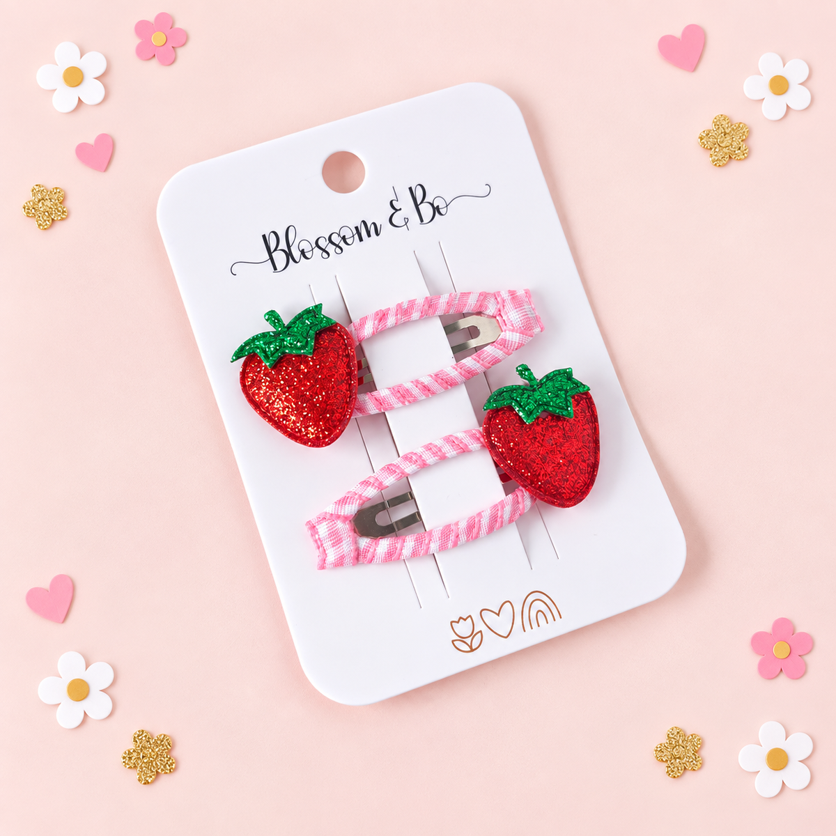 Pair of strawberry hair clips with glitter strawberry details and pink gingham ribbon