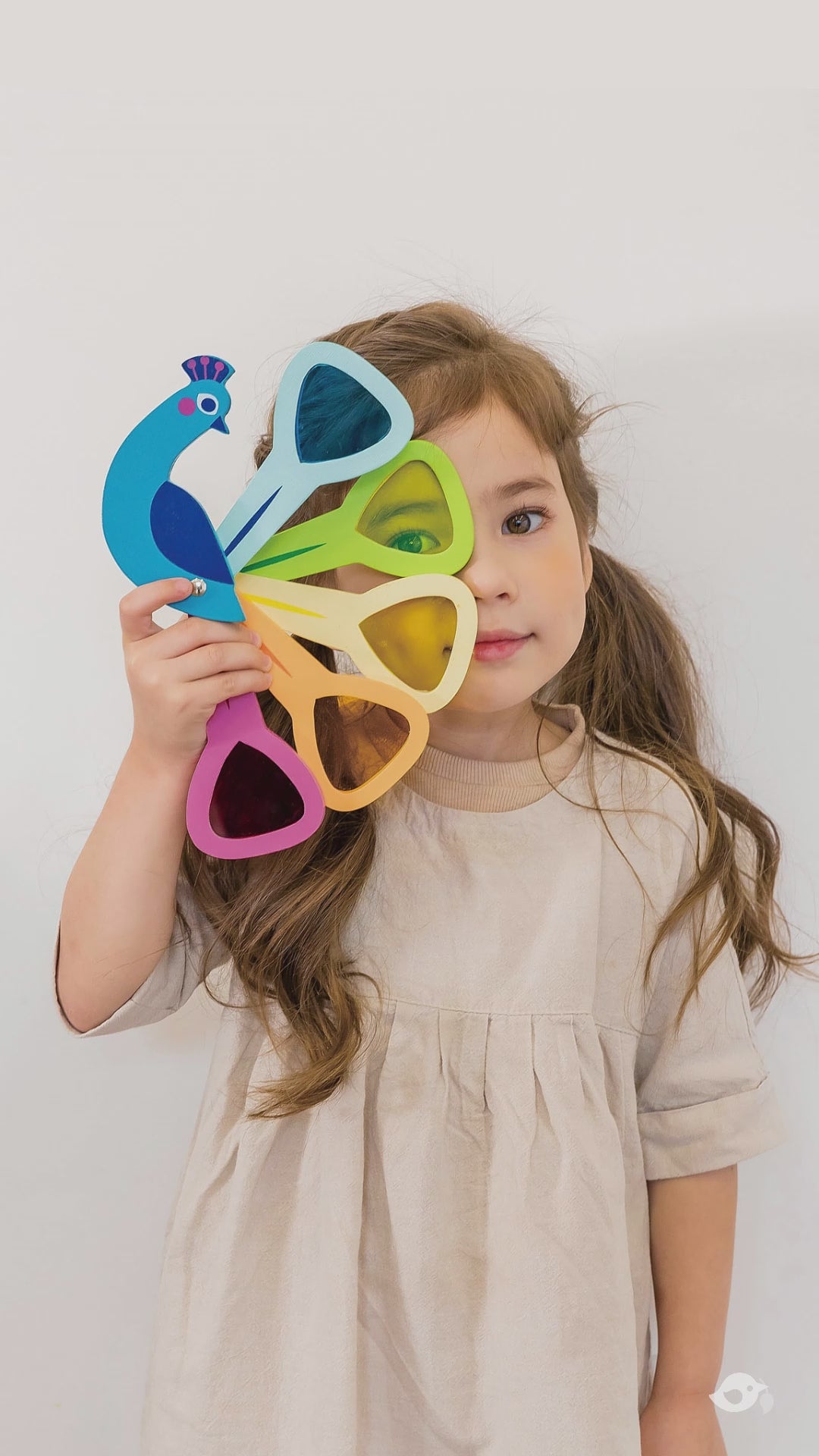 Video showing the colourful wooden peacock wooden toy
