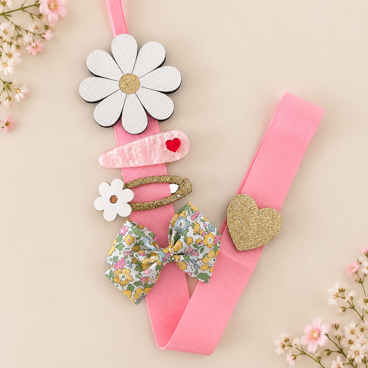 Daisy hair clip holder with pink ribbon displaying girls' hair clips and bows